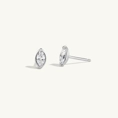 td {border: 1px solid #ccc;}br {mso-data-placement:same-cell;} td {border: 1px solid #ccc;}br {mso-data-placement:same-cell;} Details Solid 14K gold architectural studs with prong set marquise diamonds. Measurements Carat Weight: 0.34 Shipping Each piece of jewelry is carefully hand fabricated in our NYC studio so please allow 2-3 weeks for delivery. If you would like to request a rush order please contact the studio at sophie@sophieratner.com. Selecting faster shipping options will not speed up Happy To Meet You, Nyc Studio, Marquise Diamond, Speed Up, The Studio, Prong Setting, 3 Weeks, Rush, Diamonds