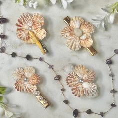 Welcome to our seaside-inspired collection of Shell Barrettes! 🐚 Perfect for adding a touch of coastal charm to any hairstyle, these exquisite barrettes are a must-have accessory for Bridal Showers, Weddings, Beach-goers, and anyone seeking those quintessential summer vibes. Crafted with love and attention to detail, each hair clip varies in size and are made with natural shells. No two barrettes are alike, making each piece a unique treasure to be cherished. Please feel free to send me a messa Wedding Hair Beach, Seashell Hair Clips, Seashell Jewelry Diy, Seashell Hair, Weddings Beach, Beachside Wedding, Wedding Barrettes, She Sells Seashells, Seashell Jewelry