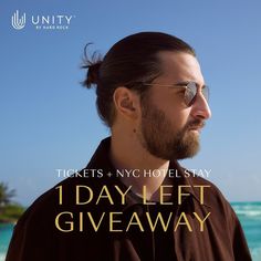 a man with sunglasses on looking out at the ocean while wearing a t - shirt that says tickets + nicholas stay 1 day left giveaway