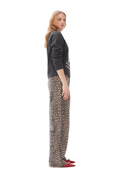 Embrace the wild side with the Graphic Wool Mix Tiger Crewneck by Ganni. This long sleeve sweater features a fierce tiger graphic on a cozy wool blend knit. Unleash your playful style and stay warm in this unique sweater. 43% Wool / 37% Recycled Wool / 20% Recycled Polyamide Hand Wash