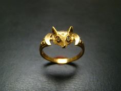 "While a great majority of the items in my shop are either Antique or Vintage (before year 2000) I've decided to include some of the designs that I'm currently making in limited quantities. This is one of those items. This is an absolutely adorable and unique 14K gold fox ring. It has wonderful detailing on both the fox head itself as well as on the shank. It features 2 very nice quality .01-carat diamonds in the eyes (alternate stones ie: rubies, emeralds, or sapphires are available upon reques Fox Ring, Gold Fox, Tally Ho, Fox Jewelry, Mens Gold Wedding Band, Snake Ring Silver, Lapis Ring, Diamond Eyes, Ring With Diamond