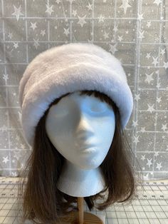 "I made this beautiful Snow White hat out of soft white beaver faux fur and white fleece. The brim is a 3 1/2 inch frame of white beaver faux fur and the hat is lined with a double layer of white fleece for warmth and comfort. Sized to fit most adults 22\"-23\" around head. The hat is a comfortable fit on my 22 1/2\" head. Spot clean or dry clean. Handmade in Albany, Oregon by me!" White Wide Brim Mini Hat For Winter, White Cloche Hat With Short Brim For Winter, White Curved Brim Hat For Winter, White Cloche Hat With Curved Brim For Winter, White Cloche Cap For Winter, White Cloche Hat With Short Brim, White Flat Brim Winter Hat, White Winter Cloche Hat, White Soft Winter Hat