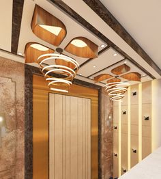 the interior of a hotel room with gold and white decor on the walls, wooden paneling and lights hanging from the ceiling