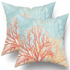 two decorative pillows with corals on them