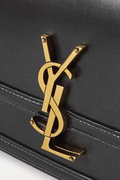 Black Solferino small leather shoulder bag | SAINT LAURENT | NET-A-PORTER Ysl Lipstick, Saint Laurent Shirt, Black And Gold Theme, Ysl Handbags, Saint Laurent Jeans, Women Lipstick, Metal Accessories, Saint Laurent Bag, Quilted Bag