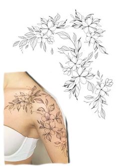 a woman's shoulder with flowers and leaves on it