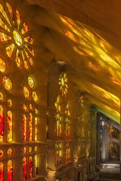 the interior of a church with stained glass windows