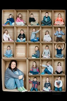 a woman sitting on top of a wooden box filled with lots of small children's faces