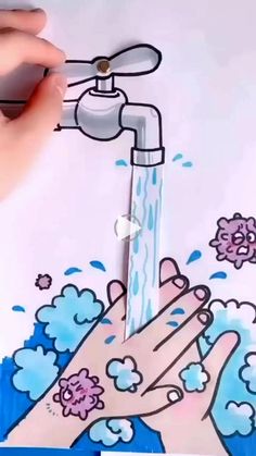 someone is drawing on paper with water coming out of the faucet and spraying it