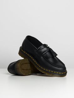 The Women's Adrian Smooth Leather Tassel Loafers from Dr MartensMade at the original Dr. Martens Cobbs Lane factory, The Adrian Tassel Loafer first hit the streets in 1980. They've been a hit ever since. These black loafers feature:-Double tassel styling-Iconic legacy DM features including yellow stitching and grooved edges-Air-cushioned sole-Slip resistant outsole for improved traction Adrian Tassel Loafer, Dr Martens Loafers, Dr Martens Adrian, Dr Martens Womens, Women's Slip Ons, Boots For Short Women, Black Loafers, Tassel Loafers, Leather Tassel