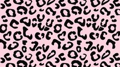 a black and white animal print pattern on a pink background, with the letters in different sizes