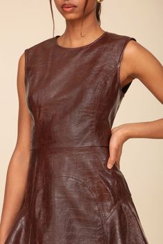 Crocodile textured faux leather adds an edge factor to our feminine fit-and-flare mini dress, which features a crewneck, hidden back zipper closure, and fully-lined interior. Available in a chocolate brown colorway. Style #: 83658 Flare Mini Dress, Jewel Neck, Ladies Dress Design, Cute Woman, Biker Jacket, Fit & Flare, Chocolate Brown, New Shop, Dress Collection