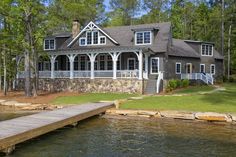 a house with a dock in front of it