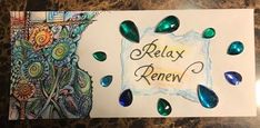 a piece of paper that says relax, reenw and surrounded by green tears