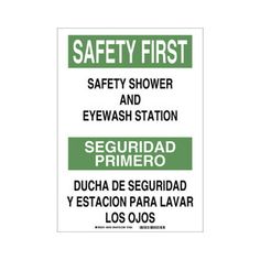 a sign that says safety first, safety shower and eyewash station seguridad primero