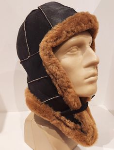 Leather Windproof Hats For Outdoor Use, Leather Hat With Ear Flaps For Outdoor, Winter Brown Aviator Hats, Brown Aviator Winter Hats, Brown Winter Hats, Winter Windproof Leather Hat, Classic Windproof Hat For Outdoor, Winter Leather Windproof Hat, Brown Insulated Winter Hat