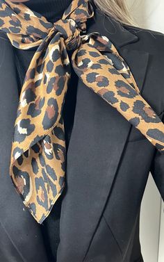 Introducing our leopard print satin scarf, a luxurious accessory designed to add a touch of wild elegance to your ensemble. Crafted from high-quality polyester satin, this scarf boasts a silky smooth texture that drapes beautifully and feels luxurious against your skin. Featuring a bold leopard print pattern, this scarf captures the essence of untamed beauty, making a statement wherever you go. The rich hues and intricate details of the print add depth and dimension, ensuring that you stand out Leopard Pants Outfit, Leopard Accessories, Cheetah Scarf, Leopard Print Accessories, Leopard Print Pattern, Leopard Pants, Leopard Scarf, Satin Scarf, Animal Print Scarf