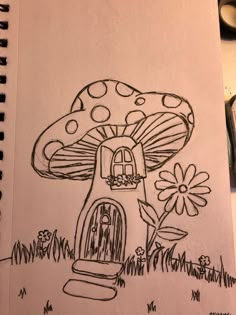 a drawing of a mushroom house in the grass