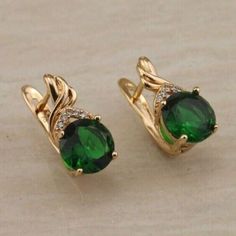 (eBay) Find many great new & used options and get the best deals for 2Ct Round Cut Simulated Emerald Stud Earring's 14K Yellow Gold Plated at the best online prices at eBay! Free shipping for many products! Gold Emerald Earrings, Emerald Fashion, Small Earrings Gold, Emerald Earrings Studs, Gold Pendant Jewelry, Gold Ring Designs, Bangles Jewelry Designs, Gold Jewelry Simple, Halo Earrings Studs