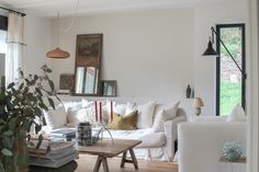 the living room is clean and ready to be used as a place for reading or relaxing