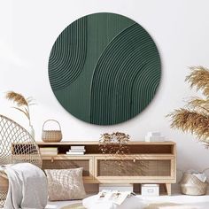 a living room with wicker furniture and green wall art