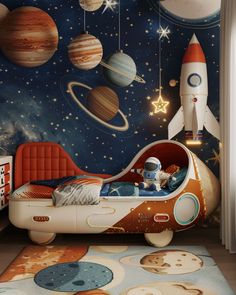 a child's bedroom decorated in space themed decor