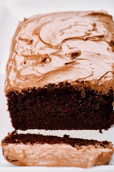 a close up of a piece of cake on a plate with frosting in the middle