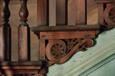 an old wooden stair case on the side of a building