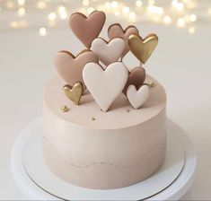 there is a cake that has hearts on it