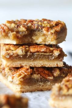 three pecan bars stacked on top of each other