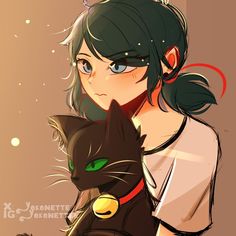 a woman holding a black cat with green eyes