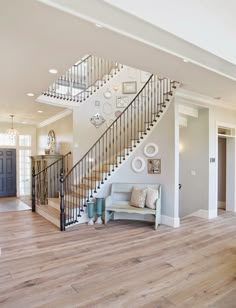 an open floor plan for a house with stairs