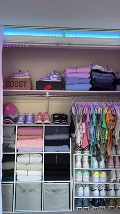 a closet filled with lots of clothes and shoes