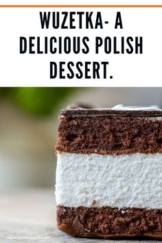 a piece of cake with white and brown frosting on top, sitting on a table