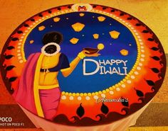 a decorated birthday cake with the name happy diwali on it