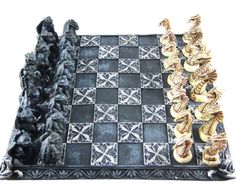 the chess board is made out of black and white marble