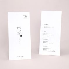 two white cards with the word menu printed on them