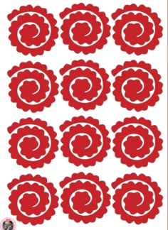 red paper flowers with white circles in the middle and one circle at the bottom, on a