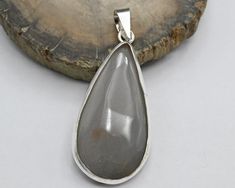 Title: 925 Sterling Silver Pendent Oval Gray Chalcedony Pendant Handcrafted Gemstone Jewelry for Her Description:- Embrace the serene beauty of this Oval Gray Chalcedony Pendant, meticulously handcrafted to elevate your style. This exquisite piece features a captivating oval-shaped blue chalcedony gemstone, known for its calming energy and soothing hues. Speciality & Benefits Of Wearing Natural Oval Gray Chalcedony Pendant :- Natural Beauty: Each Gray Chalcedony is a unique work of nature, showc Silver Pendent, Turkey Design, Turkey Colors, Blue Chalcedony, Jewelry For Her, 925 Jewelry, Purple Amethyst, Meaningful Gifts