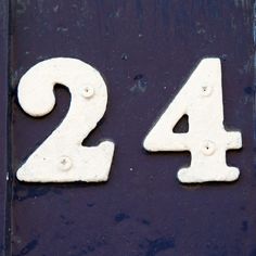 the number twenty four is written in white