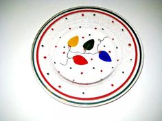 a white plate with colorful designs on it