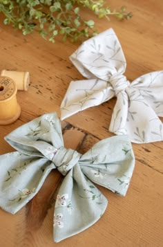 three different types of fabric bows on a table