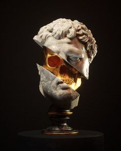 a sculpture of a man's head with glasses on it