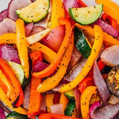 a white plate topped with lots of vegetables