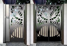 two metal gates with intricate designs on them