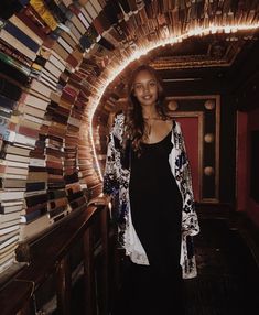 a woman standing in front of a book shelf with books on it and the caption reads, 10 likes dimavov getting to show her around a town i barely know