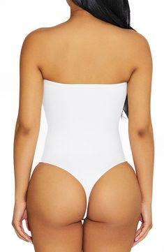 With comfy compression and a crepe-like finish, this curve-hugging bodysuit in a strapless silhouette is a versatile addition to your going-out wardrobe. Strapless 95% viscose, 5% spandex Hand wash, line dry Imported Strapless Shaping Bodysuit With Built-in Bra, Strapless Shaping Bodysuit Shapewear, Strapless Smoothing Bodysuit Shapewear, Strapless Smoothing Shapewear Bodysuit, Strapless Shaping Bodysuit, Strapless Shapewear Bodysuit With Built-in Bra, Strapless Shapewear Bodysuit With Lined Body, Elegant Strapless Smoothing Bodysuit, Solid Strapless Smoothing Bodysuit