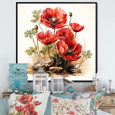 an arrangement of red flowers on a white background in a room with pillows and other items