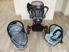 two baby strollers and one infant car seat are sitting on the floor next to each other