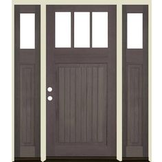 the front door is painted gray and has two sidelights on each side, with one light